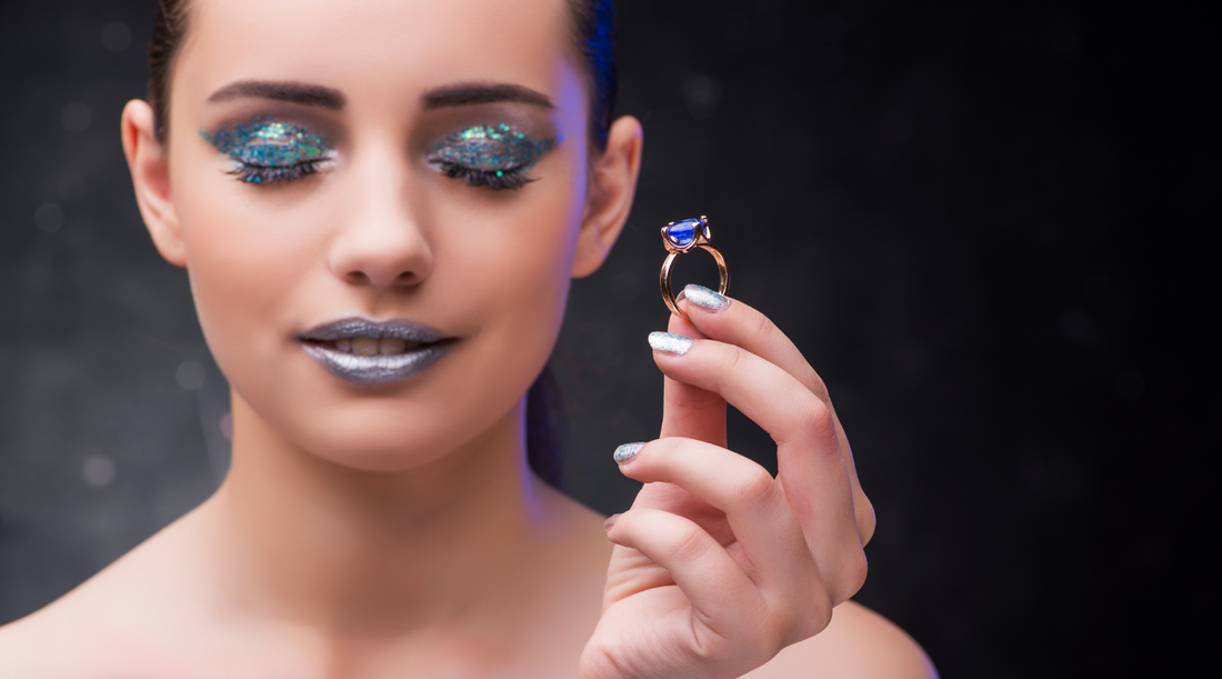 Woman with makeup and silver jewellery